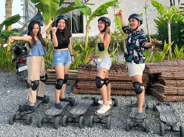 Group of guests on electric skateboards, Siargao